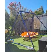 Customer photo: 150cm orange mat nest swing on the swing set stand in a backyard