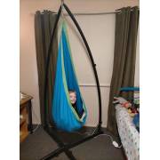Customer photo: blue and green pod chair on the X stand in a bedroom