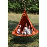 Three children inside an orange Cacoon single hung from a tree