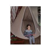 Child sitting in a taupe Cacoon single indoors