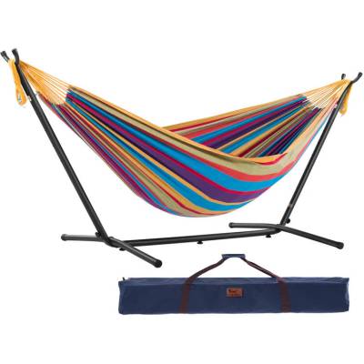 Mixed bright colours cotton hammock on a black steel stand with its carry bag, on white