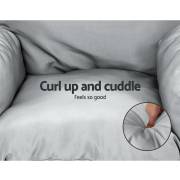Close up of the grey seat cushion and pillow