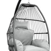 Close up of the grey open weave pod with its cushion and pillow