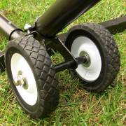 Wheel kit on a steel hammock stand leg on grass