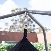 Carabiner and hanging strap of the cocoon at the top of the steel frame
