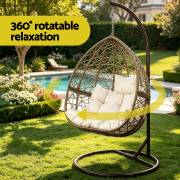Latte rattan egg chair beside a pool, showing that it turns a full circle