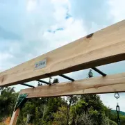 Close-up of the timber top beam and monkey bar rungs