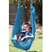 Man and boy sitting together in the medium teal wrap swing