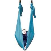 Boy sitting in the medium teal wrap swing hung from two points