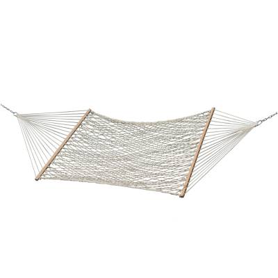 Natural cotton rope hammock with wooden spreader bars, on white