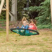 Two girls sitting together on the 120cm web swing
