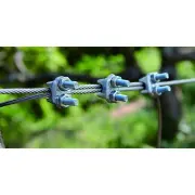 Close-up of the three U clamps holding the end of the main cable