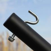 Close up of the hook and bolt at one end of the three beam stand